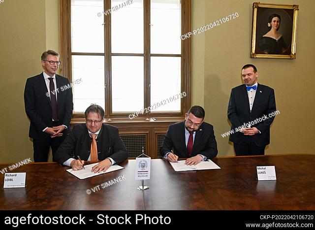 House of Bavarian History Director Richard Loibl, second left, and Prague National Museum General Director Michal Lukes, second right, sign agreement in Prague