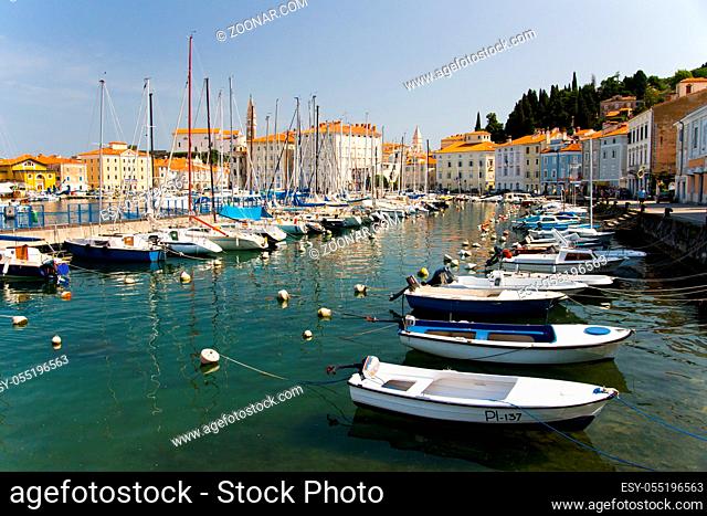 PIRAN, SLOVENIA - JUNE 25: Boats moored at sunset in Piran harbour on June 25th 2007