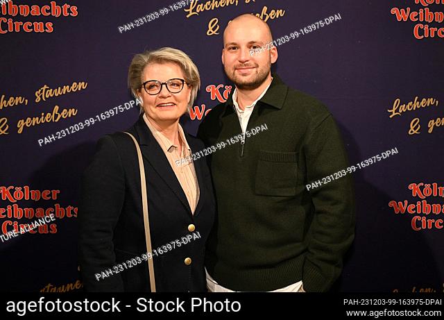 02 December 2023, North Rhine-Westphalia, Cologne: Actress Andrea Spatzek and her son Alexander attend the premiere of the 8th Cologne Christmas Circus Photo:...