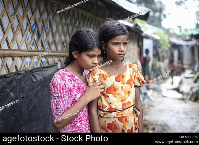 Rohingya girls, in an attack on their home village they lost their parents, the older of the two was joined on the run, with the help of an uncle they could...