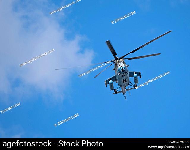 MOSCOW, RUSSIA - MAY 7, 2021: Avia parade in Moscow. helicopter mi-24 in the sky on parade of Victory in World War II in Moscow, Russia