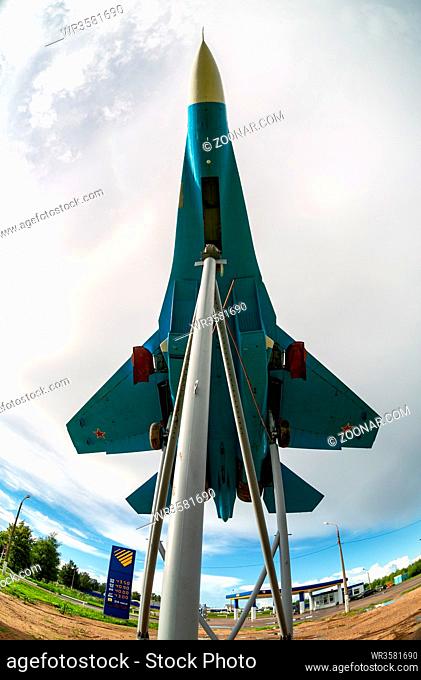 Bologoe, Russia - July 8, 2017: Russian fighter SU-27 as monument against the cloudy sky