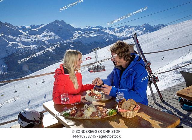 Couple in mountain restaurant Trutz over Saint Moritz, Grisons