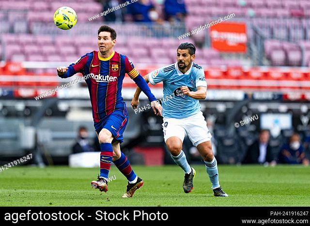 Lionel Messi (FC Barcelona) duels for the ball against Nolito, during La Liga football match between FC Barcelona and Celta de Vigo