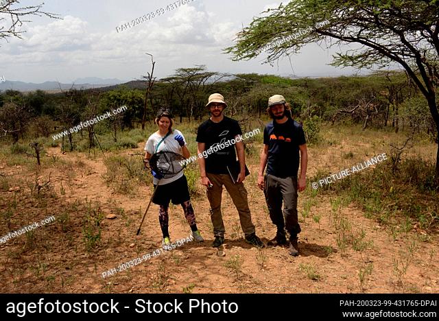 03 March 2020, Kenya, Archers Post: Inga Petelski, Yannick Günzel (M) and Felix Oberhauser stand in the Samburu region in the north of Kenya