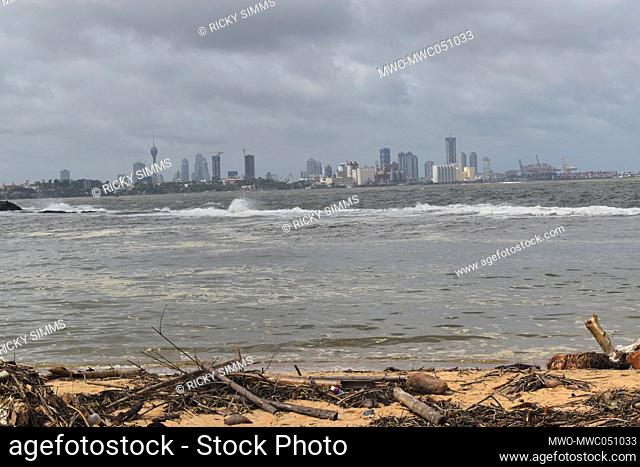 Wood and plastic wastage has washed ashore due to rough seas in the Indian ocean in the outskirts of Colombo. Sri Lanka
