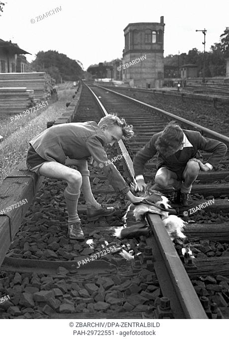 After the ballot vote for the continuation of the strike of the East German State Railway, children play at the empty rails of the suburban train in West Berlin