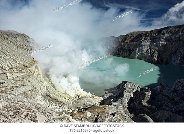 view of the smoking Kawah Ijen volcanic crater and lake, Java, Indonesia