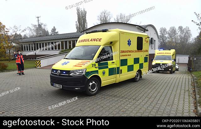 A convoy of ambulances, with five patients infected with coronavirus, accompanied by police officers leaves Kromeriz, Czech Republic, on November 6, 2020