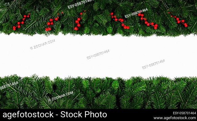 Christmas Border frame of tree branches and red berries on white background with copy space isolated