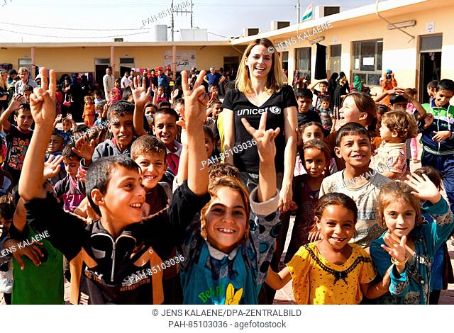 EXCLUSIVE - UNICEF ambassador Eva Padberg is surrounded by refugee children in the Debaga refugee camp between Mosul and Erbil, Iraq, 18 October 2016