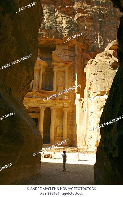 Al-Khazneh, cut out from the red sandstone meets the visitors in Petra (UNESCO world herritage site). Jordan