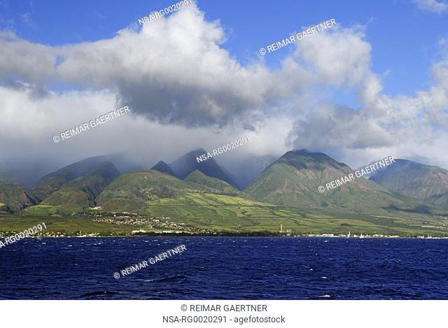 Steep gulches of west Maui mountains at Lahaina from the sea
