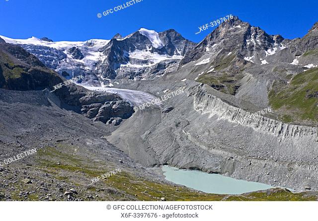 Moiry Glacier, Glacier de Moiry, flowing down the Pointe de Mourti, ending in a glacier tongue, moraine and the glacial lake, Val d'Anniviers, Valais