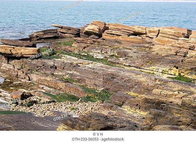 Eroded rock layers on the seashore of Tung Ping Chau, Hong Kong