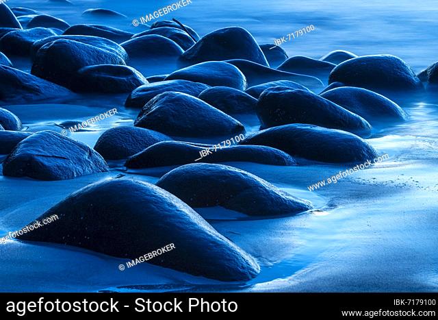 Winter Scandinavian landscape with stormy sea, Uttakleiv strand, sea, rocks, blue hour, long exposure, Leknes, Nordland, Lofoten, Norway, Europe