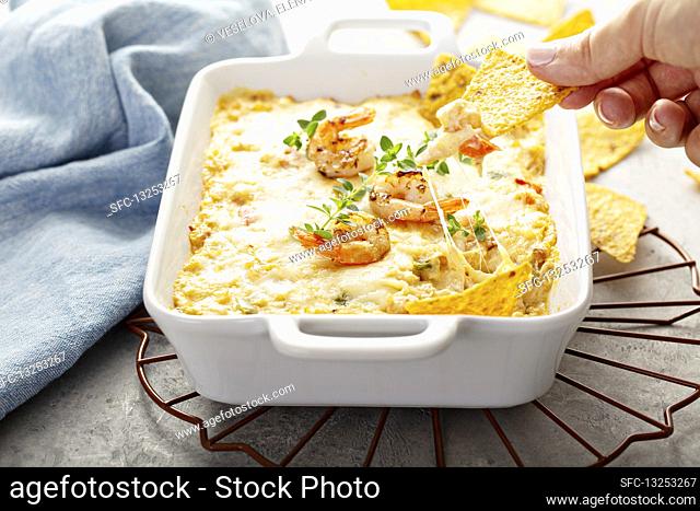 Spicy cheese and shrimp dip with tortilla chips