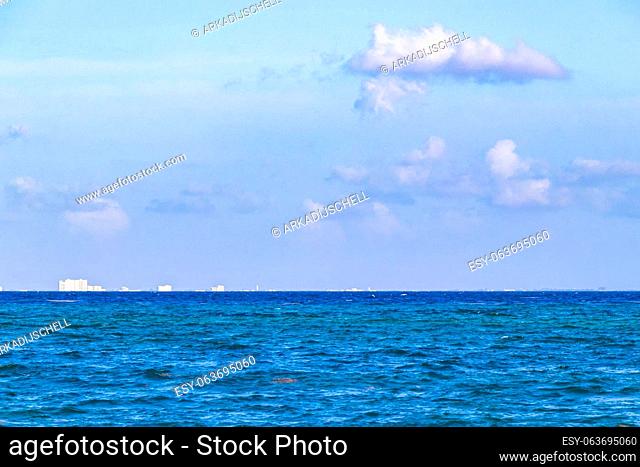 Tropical mexican beach landscape panorama view to Cozumel island cityscape with clear turquoise blue water in Playa del Carmen Quintana Roo Mexico