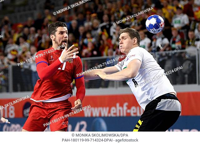 Germany's Finn Lemke (R) in action against Czech Republic's Ondrej Zdrahala during the European Handball Championship match between Germany and the Czech...