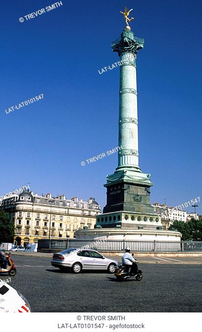 Place de la Bastille. Monument to fall of la Bastille. French Revolution. Gold statue. Pillar. Traffic