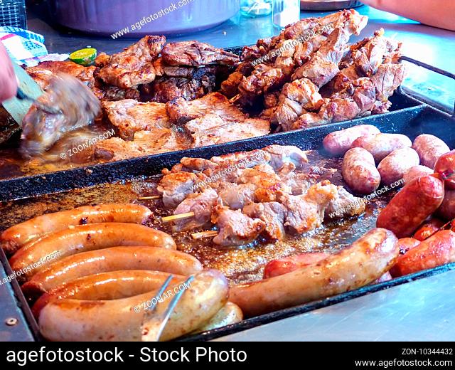 Display of cooked meat for asado at Mercado 4 in Asuncion, Paraguay. Asado is a traditional dish in Paraguay and usually consists of beef alongside various...