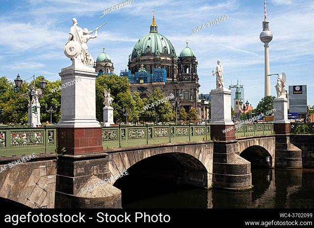 Berlin, Germany, Europe - View of the Berlin Cathedral on the Museum Island with the Schlossbruecke bridge and the Television Tower at Alexanderplatz in the...
