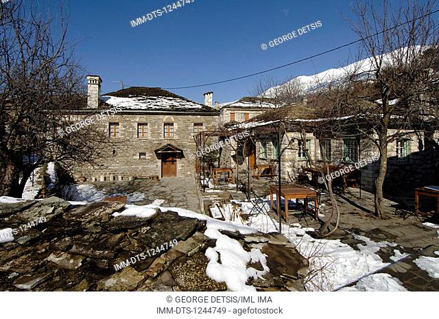 Snowy Mikro Papingo village. Mikro Papingo, Ioannina, Epiros, Greece, Europe