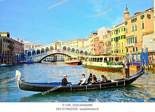 VENICE - March 28: Gondola at Rialto Bridge on March 28, 2012 in Venice, Italy. There were several thousand gondolas in the 18th century