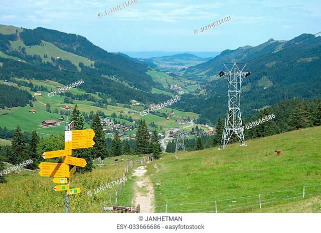 Trail direction signs nearby Grosser Mythen mountain in Alps in Switzerland