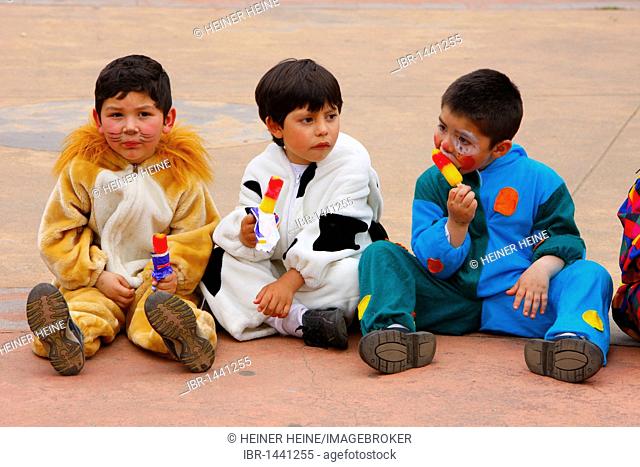 Children dressed up, licking ice cream, Mapuche Indians, Temuco, Southern Chile, Chile, South America