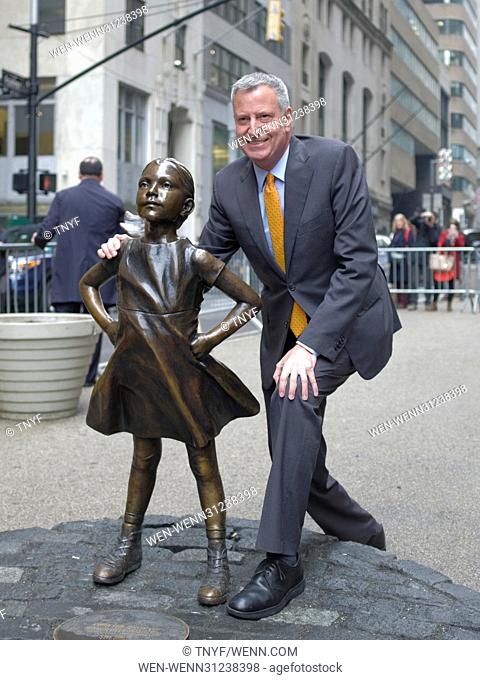 Mayor Bill de Blasio poses with Fearless Girl statue Featuring: Mayor Bill de Blasio Where: Manhattan, New York, United States When: 27 Mar 2017 Credit:...