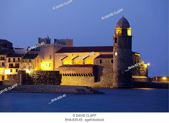 The Church of Notre-Dame-des-Anges at dusk from the harbour at Collioure, Cote Vermeille, Languedoc-Roussillon, France, Europe