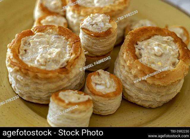 Appetizer of vol-au-vents filled with cream with hard-boiled egg and tuna