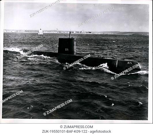Jan. 01, 1955 - Unshering in a New Era of transportation, the atomic powered submarne USS Nautilus, is pictured underway on her initial sea trial in Long Island...