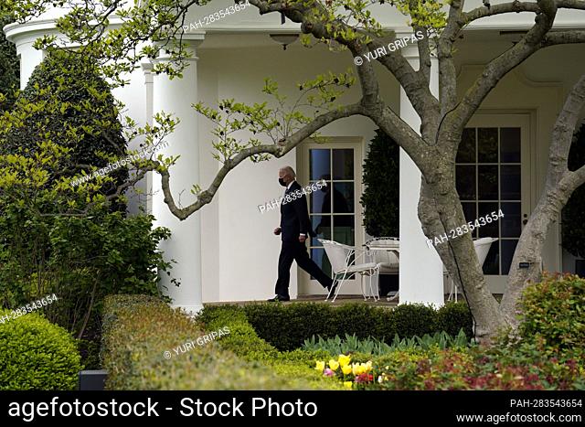 United States President Joe Biden walks from the Oval Office of the White House in Washington before his departure to Portland, Oregon on April 21, 2022