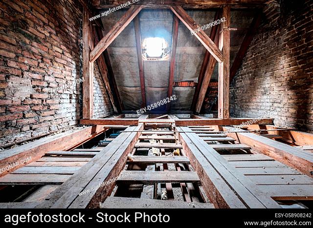 floor beams in empty attic / loft of an old building roof
