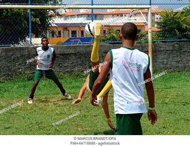 Brazilian youths in action during a practice session of the FIFA soccer project 'Football for Hope' in Salvadore, Brazil, 7 December 2013