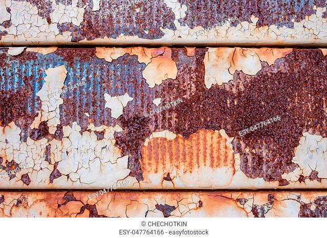 rusty metal wall or door can be used as background