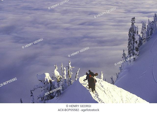 Snowboarders in backcountry near Fernie, British Columbia, Canada