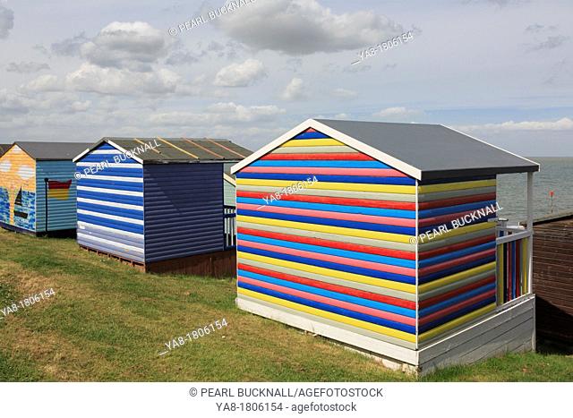 Tankerton, Whitstable, Kent, England, UK, Britain, Europe  Colourful wooden beach huts overlooking the Thames estuary on the north Kent coast