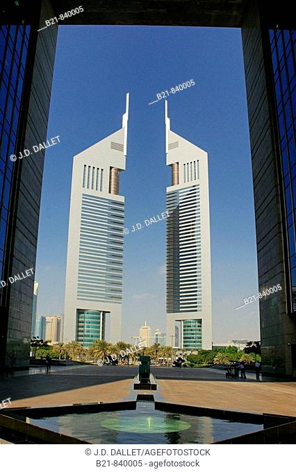 Emirates Towers from the Gate (DIFC building) at Sheikh Zayed Road, Dubai, UAE (United Arab Emirates)