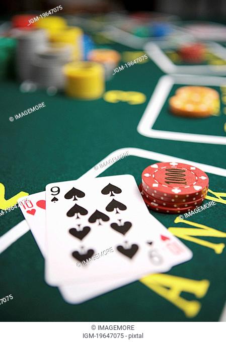 Gambling chips by playing cards