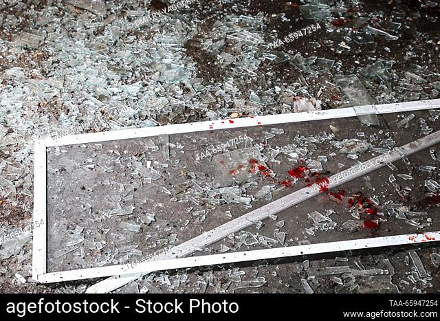 RUSSIA, DONETSK - DECEMBER 20, 2023: Blood covers shards of broken glass as the Republican Trauma Centre suffers damage from a Ukrainian military strike