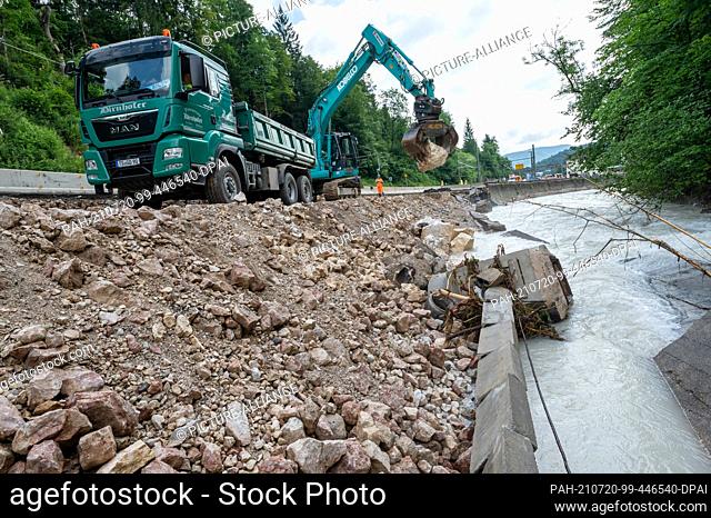 20 July 2021, Bavaria, Berchtesgaden: Shortly before the village of Berchtesgaden, half of the federal road 20 has been swept away by the Ramsauer Ache