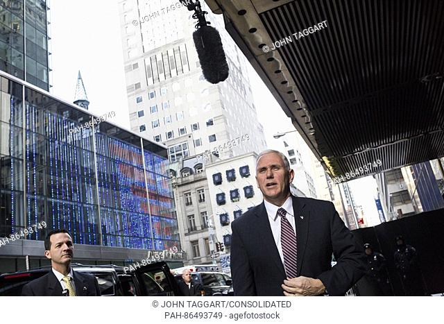 United States Vice President-elect Mike Pence, speaks to members of the media outside of Trump Tower in Manhattan, New York, U.S