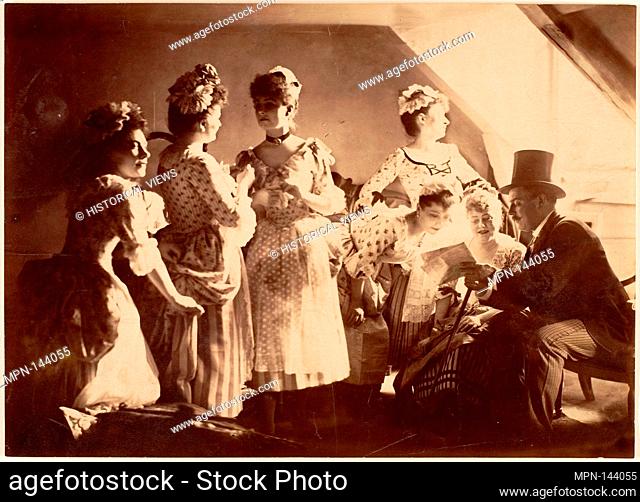 [A Group of Six Costumed Women Posed in Interior with Top Hatted Gentlemen]. Artist: Unknown (French); Date: ca. 1885; Medium: Albumen silver print from glass...