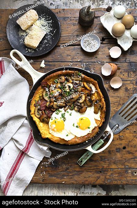 Dutch baby pancake with bacon and eggs