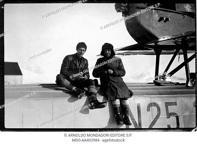 Roal Amudsen sitting with a member of his crew during his South Pole expedition. Norwegian explorer Roald Amundsen (Roald Engelbregt Gravning Amundsen) sitting...