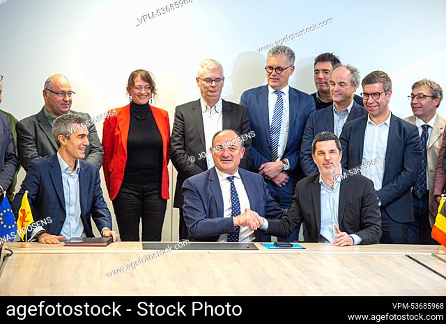 (bottom left to right) Sonaca CEO Yves Delatte and Walloon vice-minister president and minister of Economy, Foreign Trade, Research and Innovation