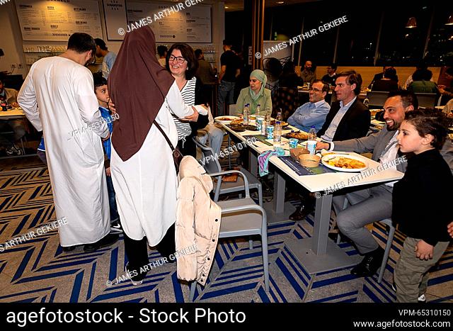 People gather for a charity iftar in favor of earthquake victims in Syria and Turkey, organized by KAA Ghent, Karama Solidarity, Voem and Averroes